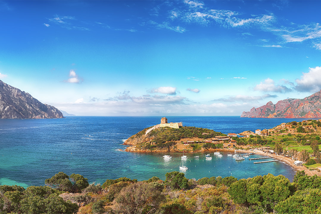 Girolata bay in natural reserve of Scandola.  It cannot be reached by car, only by walking or boats . Location:  Gulf of Girolata, Corse du Sud,  Corsica, France, Europe
